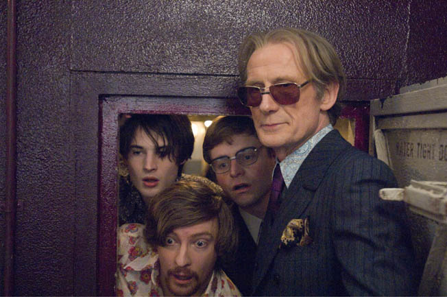 Tom Sturridge, Rhys Darby, Will Adamsdale and Bill Nighy (left to right) star in Richard Curtis' film PIRATE RADIO, a Focus Features release.  Photo Credit: Alex Bailey