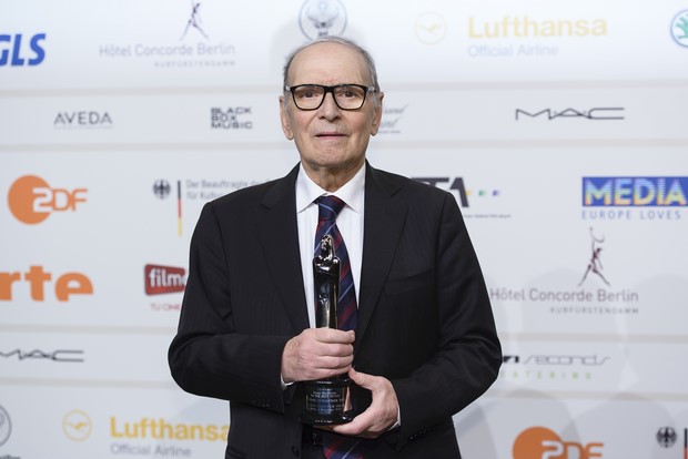 BERLIN, GERMANY - DECEMBER 07: Ennio Morricone poses with his award for european film music at the European Film Awards 2013 on December 7, 2013 in Berlin, Germany. (Photo by Clemens Bilan/Getty Images)