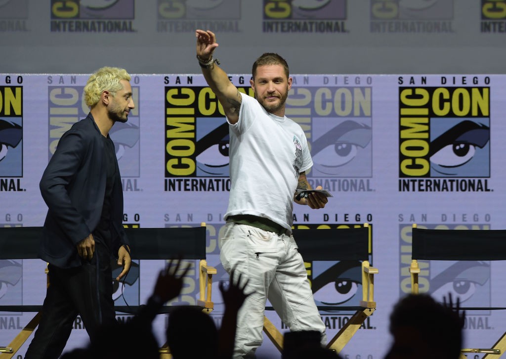 SAN DIEGO, CA - JULY 20: Riz Ahmed (L) and Tom Hardy speak onstage at the Sony Pictures' panel during Comic-Con International 2018 at San Diego Convention Center on July 20, 2018 in San Diego, California. (Photo by Kevin Winter/Getty Images)