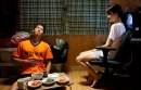 In Another Country: poster italiano e foto del film di Hong Sang-soo