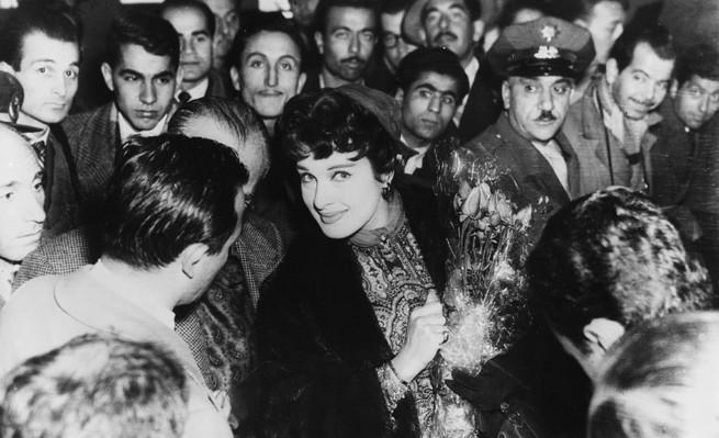 Actress Silvana Pampanini surrounded by fans as she arrives in Istanbul, December 30th 1954. (Photo by Keystone Features/Hulton Archive/Getty Images)