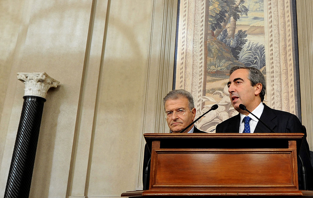 Italy's PDL party representative Maurizio Gasparri (L) and Fabrizio Cicchitto (R) addresses journalists after a meeting with Italian president on December 22, 2012 in Rome, as part of talks between the president and political leaders before dissolving parliament and formally calling a general election. Italy's election campaign kicked off today after Prime Minister's resignation opened the way for a contest dominated by a raging debate over austerity in the recession-hit country.  AFP PHOTO / TIZIANA FABI        (Photo credit should read TIZIANA FABI/AFP/Getty Images)