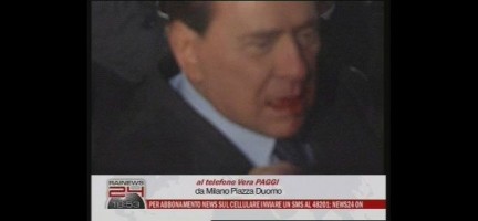 La fotosequenza dell'aggressione a Berlusconi